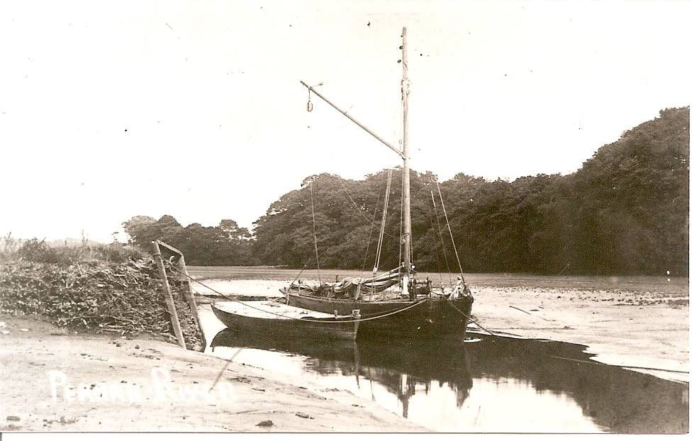 A barge moored in the Perran River